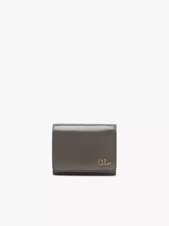 Pequeño bolso Chloé Iconic de tres pliegues con bolsillo para monedas en piel brillante
