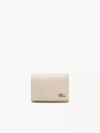 Pequeño bolso Chloé Iconic de tres pliegues con bolsillo para monedas en piel brillante