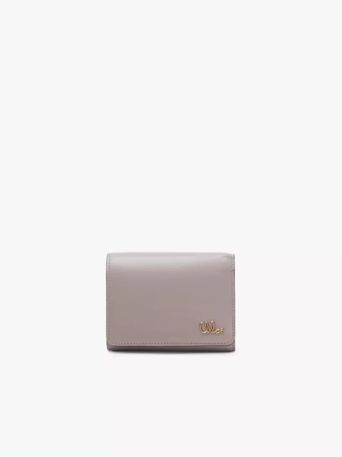 Pequeño bolso Chloé Iconic de tres pliegues con bolsillo para monedas en piel brillante