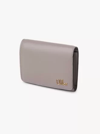 Pequeño bolso Chloé Iconic de tres pliegues con bolsillo para monedas en piel brillante