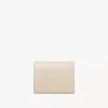 Pequeño bolso Chloé Iconic de tres pliegues con bolsillo para monedas en piel brillante