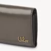 Pequeño bolso Chloé Iconic de tres pliegues con bolsillo para monedas en piel brillante