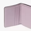 Pequeño cuaderno tríptico con alfabeto en piel granulada Pequeño cuaderno tríptico con alfabeto en piel granulada