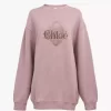 Suéter oversize con logotipo en felpa chiné Suéter oversize con logotipo en felpa chiné