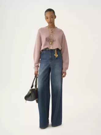 Suéter oversize con logotipo en felpa chiné