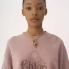 Suéter oversize con logotipo en felpa chiné Suéter oversize con logotipo en felpa chiné