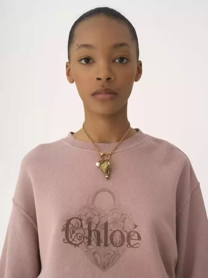 Suéter oversize con logotipo en felpa chiné Suéter oversize con logotipo en felpa chiné