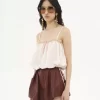 Top camisola con volantes en habotai de seda