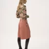 Top de cuello alto abotonado en jersey de lana Top de cuello alto abotonado en jersey de lana