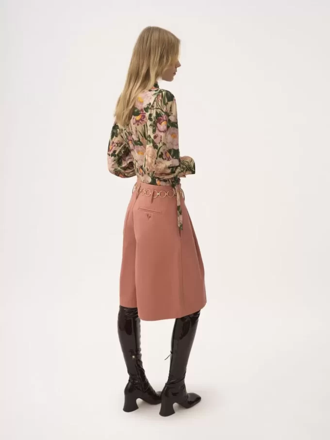 Top de cuello alto abotonado en jersey de lana Top de cuello alto abotonado en jersey de lana