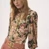 Top de cuello alto abotonado en jersey de lana Top de cuello alto abotonado en jersey de lana