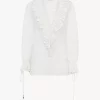 Top de cuello en V con mangas abullonadas en voile de algodón