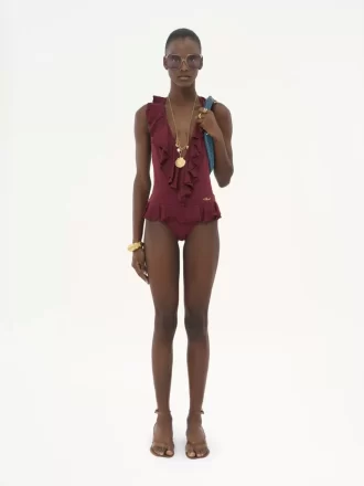 Traje de baño de una pieza con cuello en V y volantes