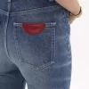 Vaqueros bootcut de tiro alto en denim Vaqueros bootcut de tiro alto en denim