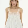 Vestido con volantes altos y bajos en habotai de seda y encaje Vestido con volantes altos y bajos en habotai de seda y encaje