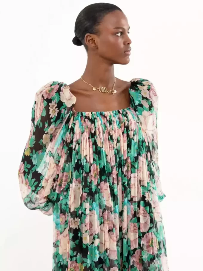 Vestido largo de muselina de seda con mangas abullonadas