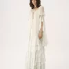 Vestido largo oversize con volantes en muselina de seda