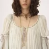 Vestido largo oversize con volantes en muselina de seda
