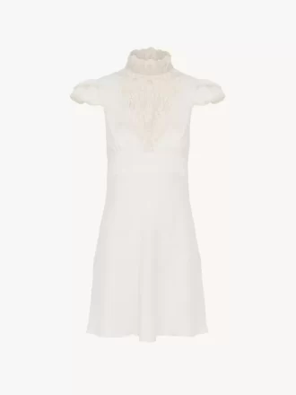 Vestido mini de cuello alto en seda jacquard y encaje