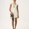 Vestido mini de cuello alto en seda jacquard y encaje